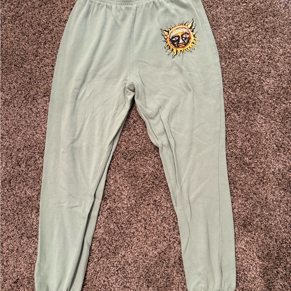 Women's Green Joggers with Sun Patch